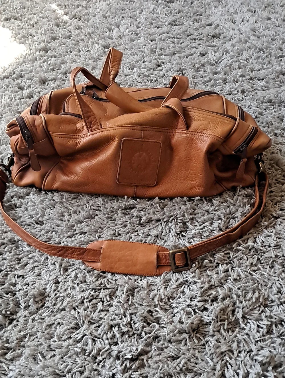 Men's Leather Duffel Bag in Cognac Brown with Adjustable Shoulder Strap